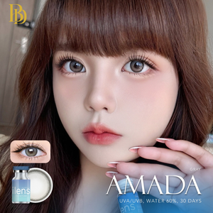 Advertisement for AMADA contact lenses with a close-up of a person's face and product packaging.