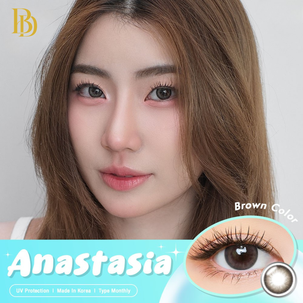 Advertisement for Anastasia brown contact lenses with a model wearing them.