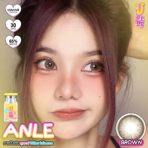 Advertisement for ANLE contact lenses with a model and product packaging.