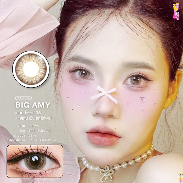 Advertisement for Big Amy contact lenses with a close-up of a person's eye and product details.