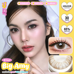 Advertisement for Big Amy brown contact lenses with a woman's face and product details.