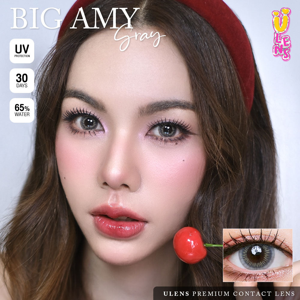 Advertisement for ULENS Premium Contact Lenses with a model wearing contact lenses and a cherry, featuring product details.