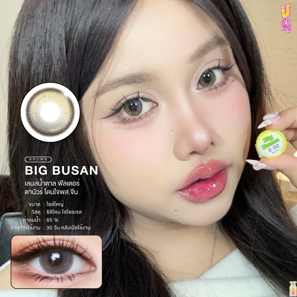 Advertisement for Big Busan contact lenses with a model holding the product.