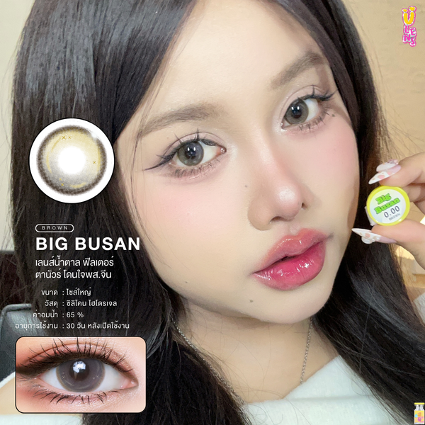 Advertisement for Big Busan contact lenses with a model holding the product.