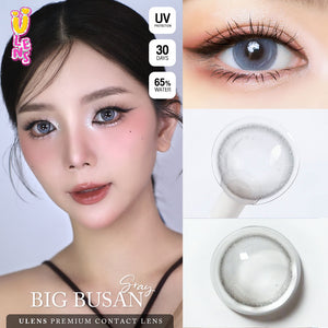 Advertisement for Big Busan contact lenses showing a model wearing them, close-up of eyes, and contact lenses.