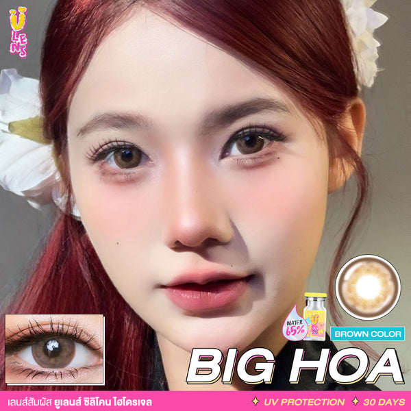 Close-up of a person with red hair wearing a flower headband, featuring contact lens packaging and text.