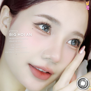 Close-up of a person with contact lenses, featuring the brand 'BIG HOI AN'.