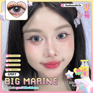 Advertisement for gray contact lenses with a bottle and product details on a colorful background