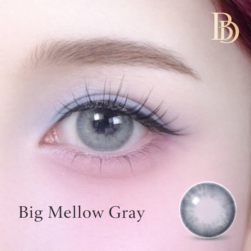 Model with makeup and 'Bua d'Or' branding on a pink background