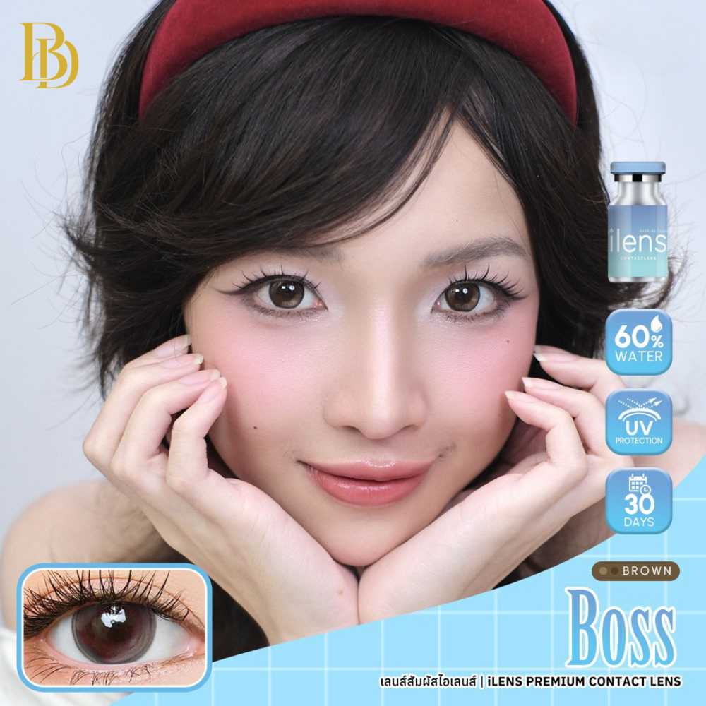 Advertisement for Boss Brown contact lenses with a model wearing a red cap and contact lens packaging.