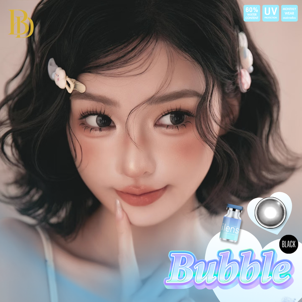 Close-up of a person with styled hair, featuring Bubble Black Cosmetic Lenses and product packaging in the corner.