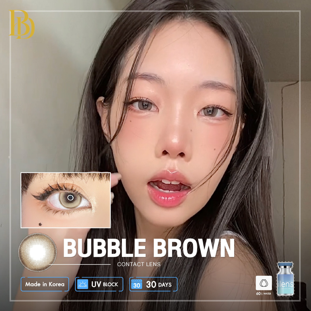 Woman with bubble brown contact lenses displayed on a close-up of her eye.