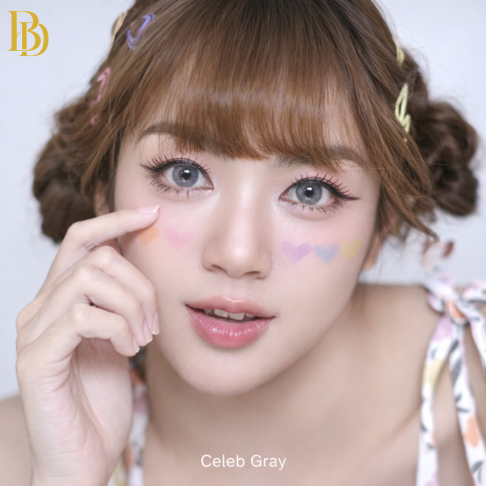 Woman with styled hair and makeup, wearing a colorful top, with 'Celeb Gray' branding.