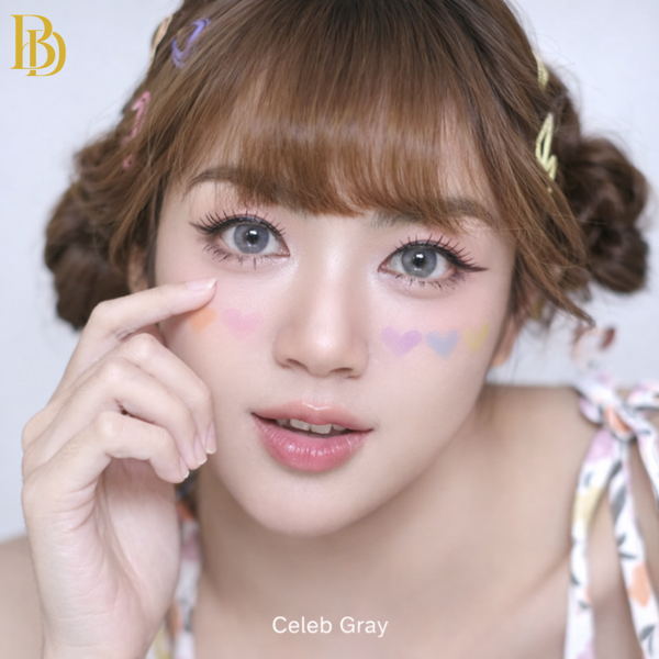 Woman with styled hair and makeup, wearing a colorful top, with 'Celeb Gray' branding.