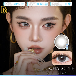 A close-up beauty graphic showing a model wearing gray contact lenses, with an inset of the lens design and an eye close-up demonstrating the look. Text reads 'CHALOTTE GRAY' and feature badges mention water content, monthly wear, UVVJ protection, and 30 days.