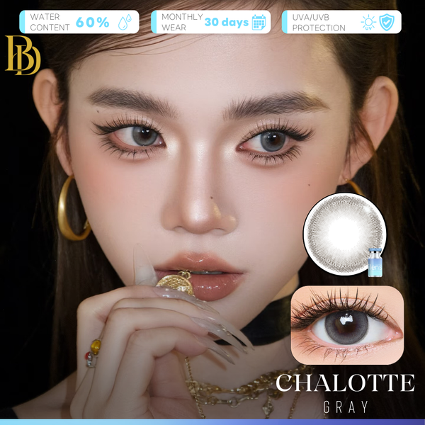 A close-up beauty graphic showing a model wearing gray contact lenses, with an inset of the lens design and an eye close-up demonstrating the look. Text reads 'CHALOTTE GRAY' and feature badges mention water content, monthly wear, UVVJ protection, and 30 days.