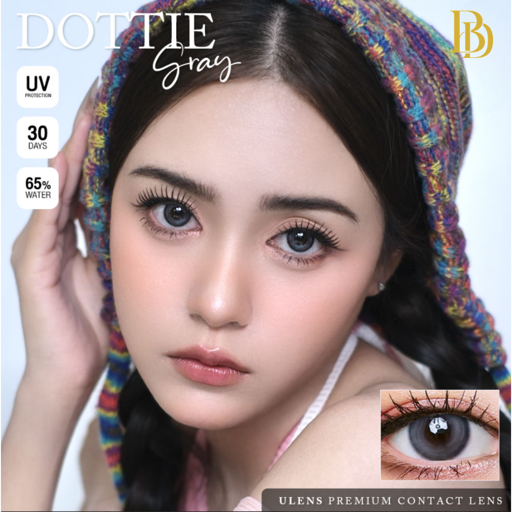 Model wearing colorful headscarf with contact lens display and product information.