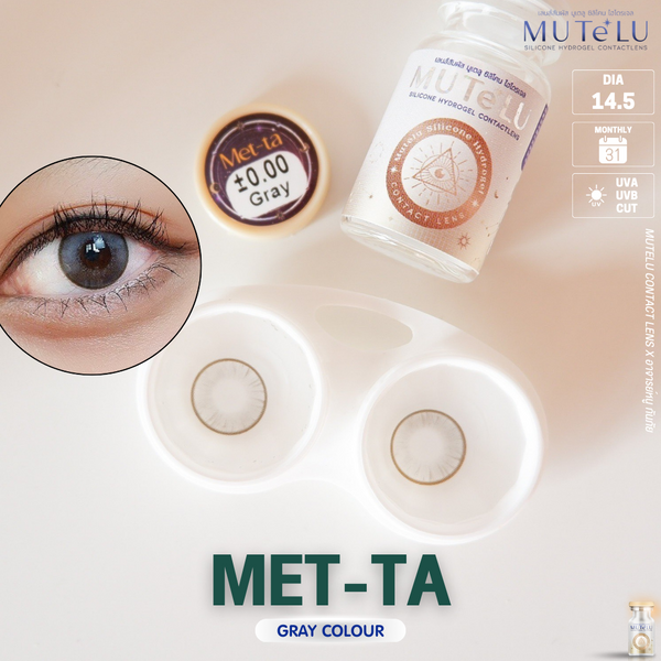 MuteLu Met-Ta gray contact lenses with packaging and an eye wearing the lenses.