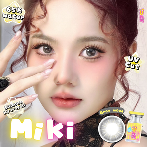 Advertisement for Miki Fashion contact lenses with product details and branding.