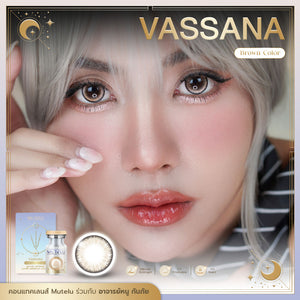 Advertisement for Vassana contact lenses with a close-up of a person's face and product packaging.